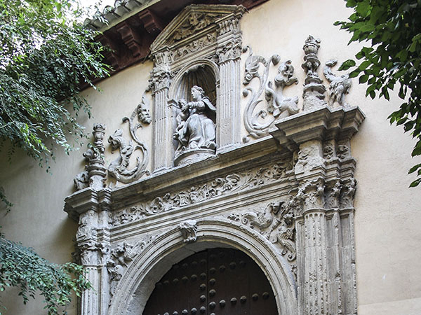 Side porch of the church. The Renaissance style is reserved for the most representative features, such as the portals